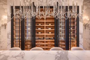 calacatta borghini wine cellar and dining table
