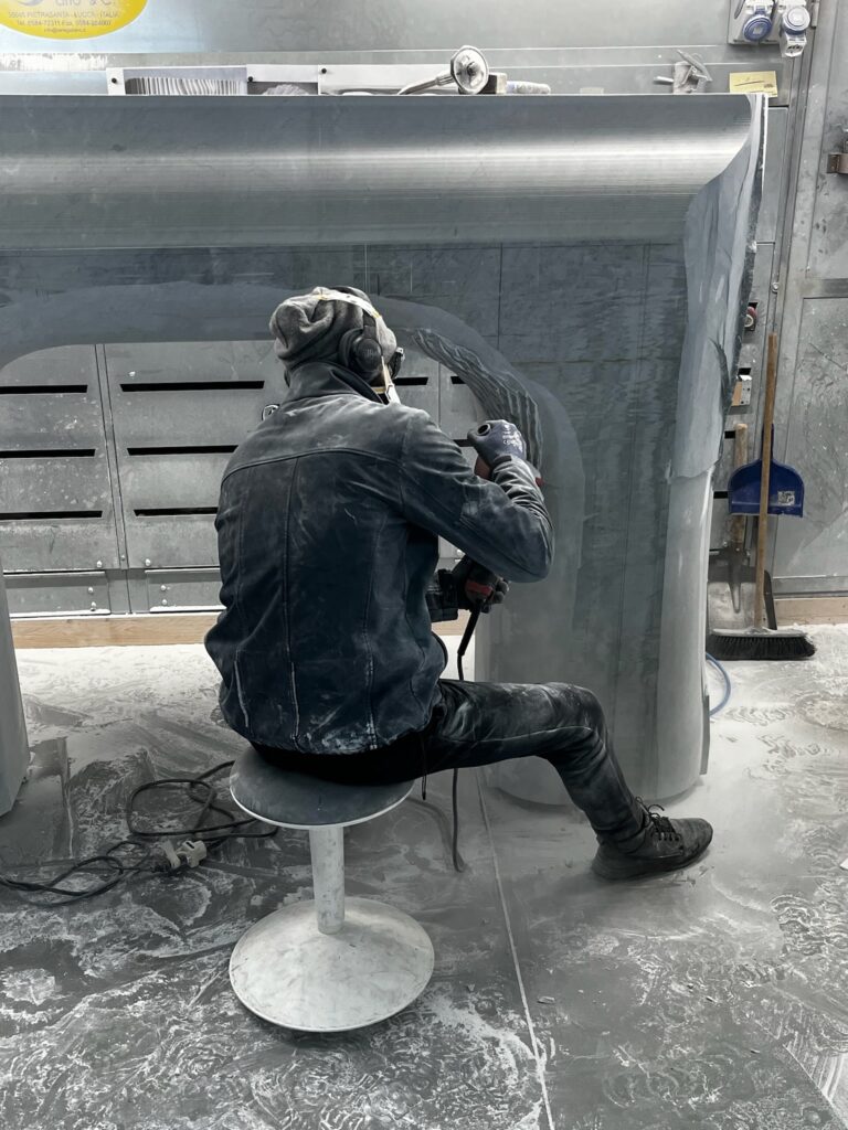 sculpting marble fireplace mantel